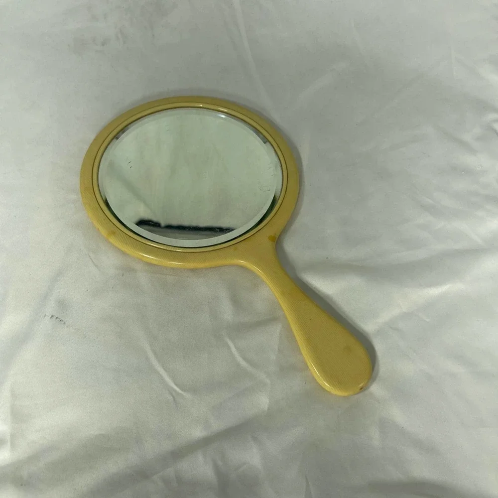 Vintage Bakelite hand held mirror